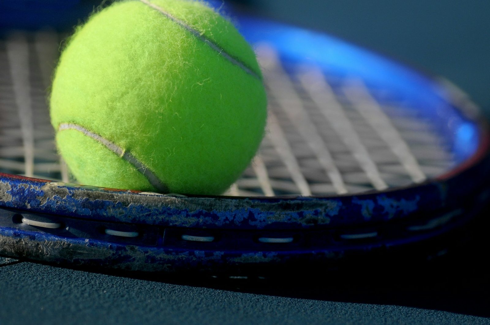 Close view of a green tennis ball