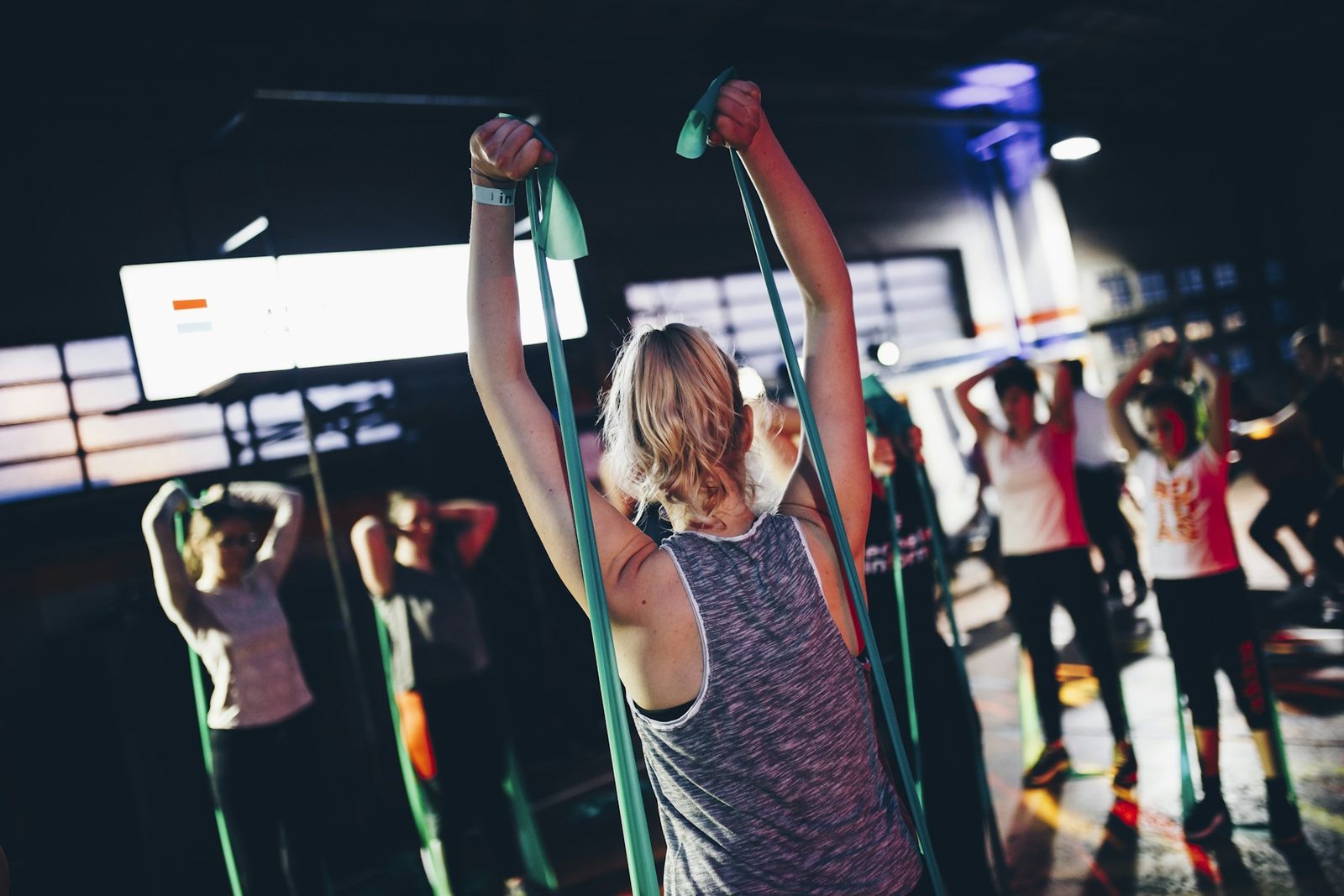 A group of people exercising together in a gym