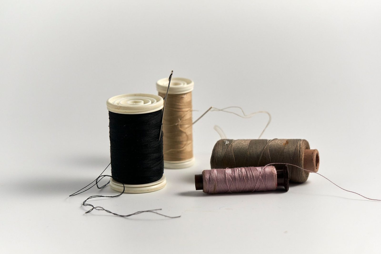 Close view of coloured threads of differing thickness