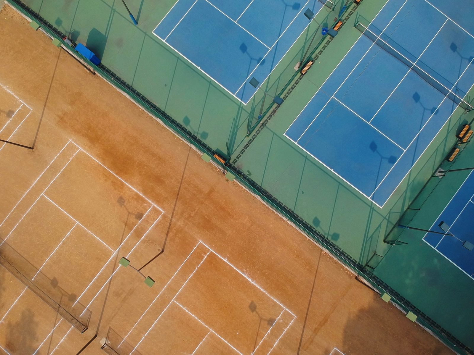 Aerial photograph of tennis courts showing the line markings