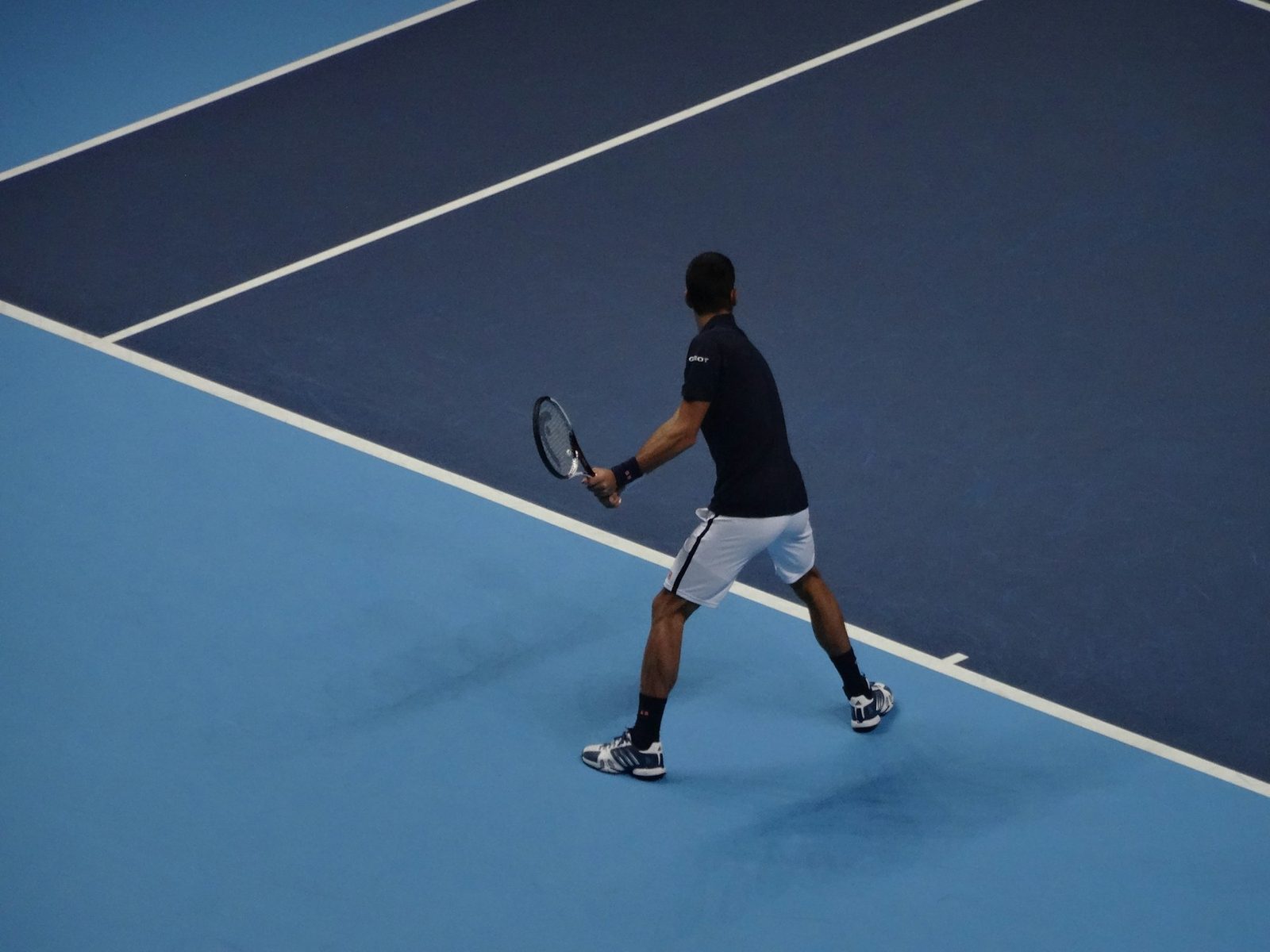 Why Do Tennis Players Bounce the Ball Before Serving?